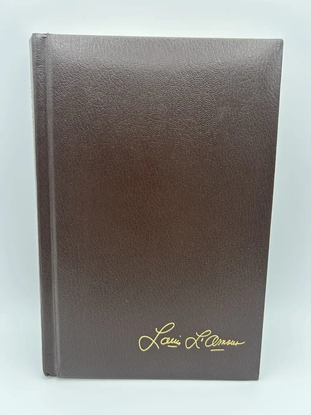 The Riders of High Rock - Imitation Leather, by Louis Lamour - Very Good b